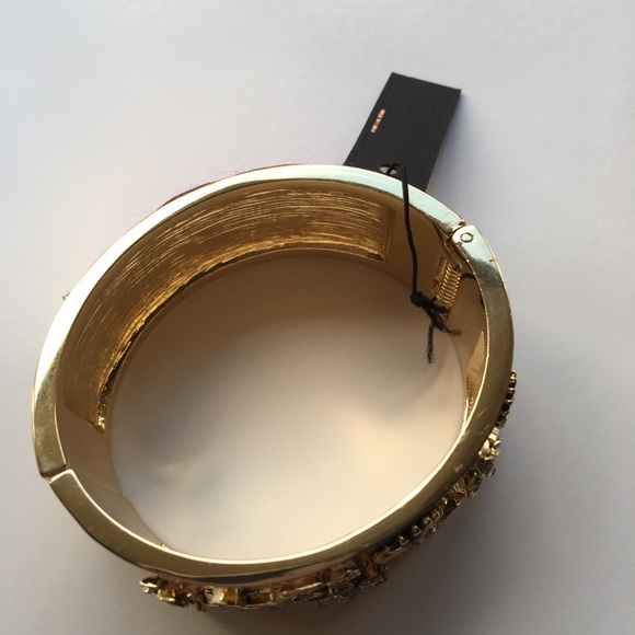 gold toned wide cuff bracelet with flowers and crystals - Picture 6 of 8